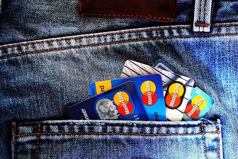 a pocket filled with Forex cards powered by MasterCard