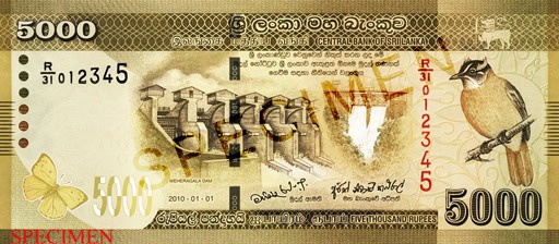 At the centre of the LKR 5000 note, drawings of two dams appear. The one on the left is the Weheragala Dam. The image on the right is the Canyon Dam. The bird to the right is the Sri Lankan Yellow-Eared Bulbul and the butterfly to the left is the Lemon Migrant.