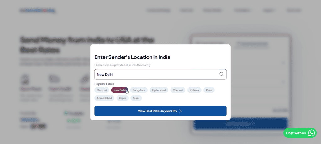 pop-up window prompting users to enter the sender's location in India. The search box has "New Delhi" typed in, and below it, a list of popular cities. A blue button labeled "View Best Rates in your City" is visible.