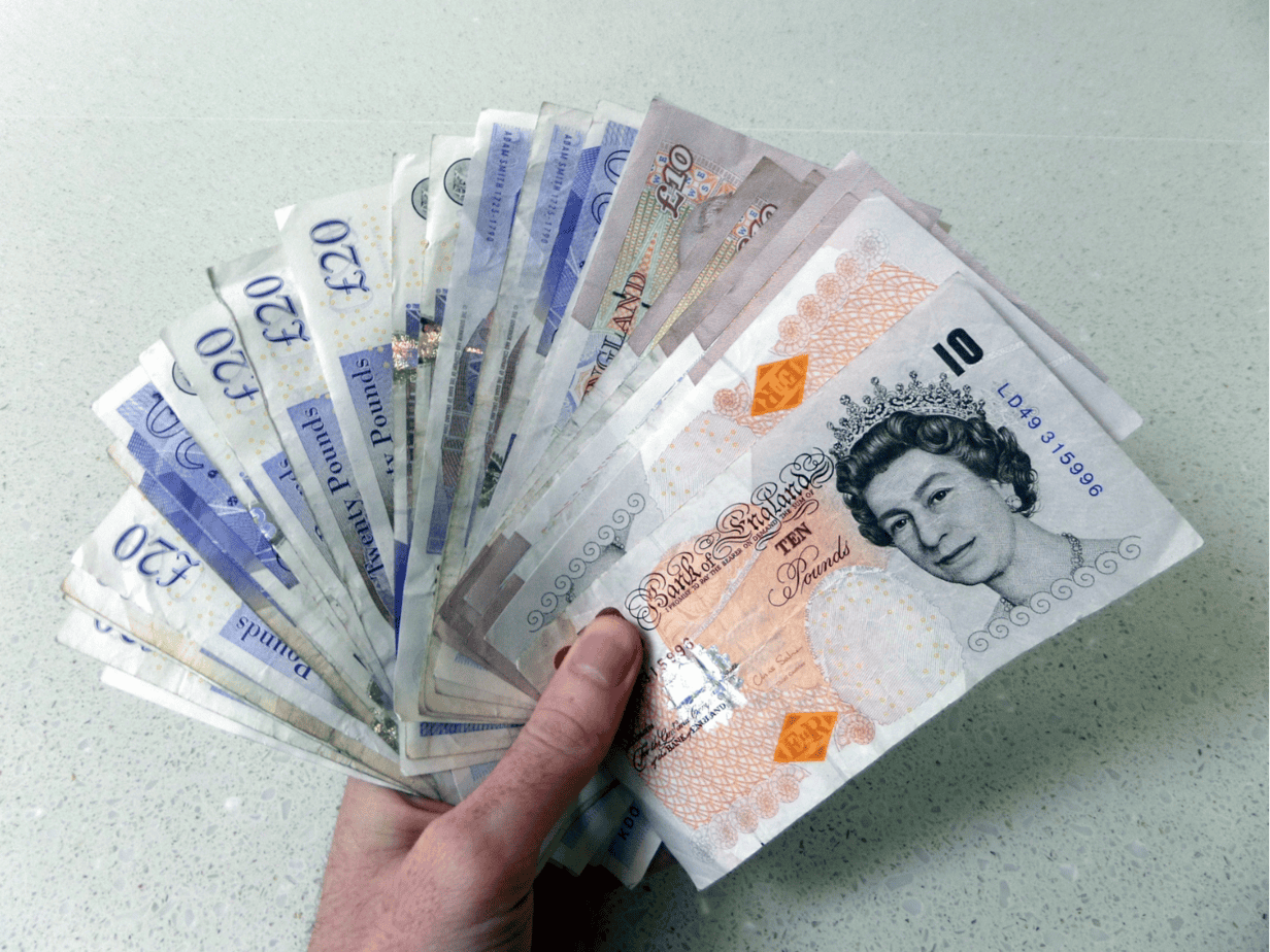 polymer GBP 10 and GBP 20 notes in hand